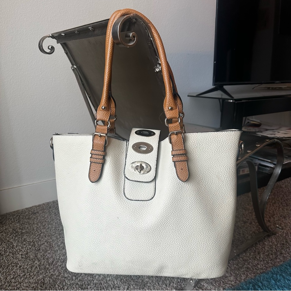 Cream tote bag with shoulder bag insert.